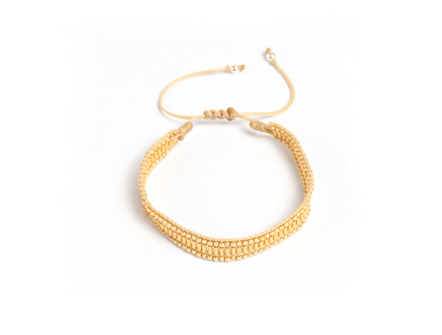Pulsera Miyuki dorada con canutillo y miyuki oro