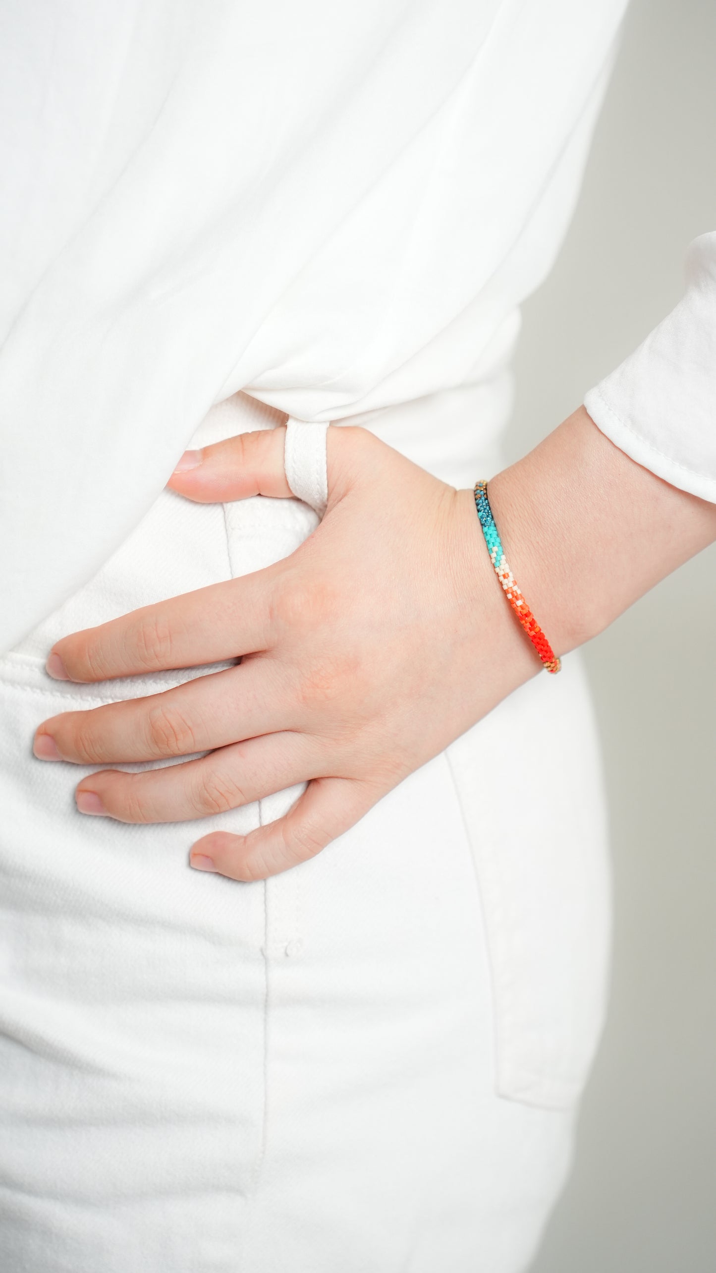 Pulsera Miyuki redonda combinación turquesa rojo naranja ocre