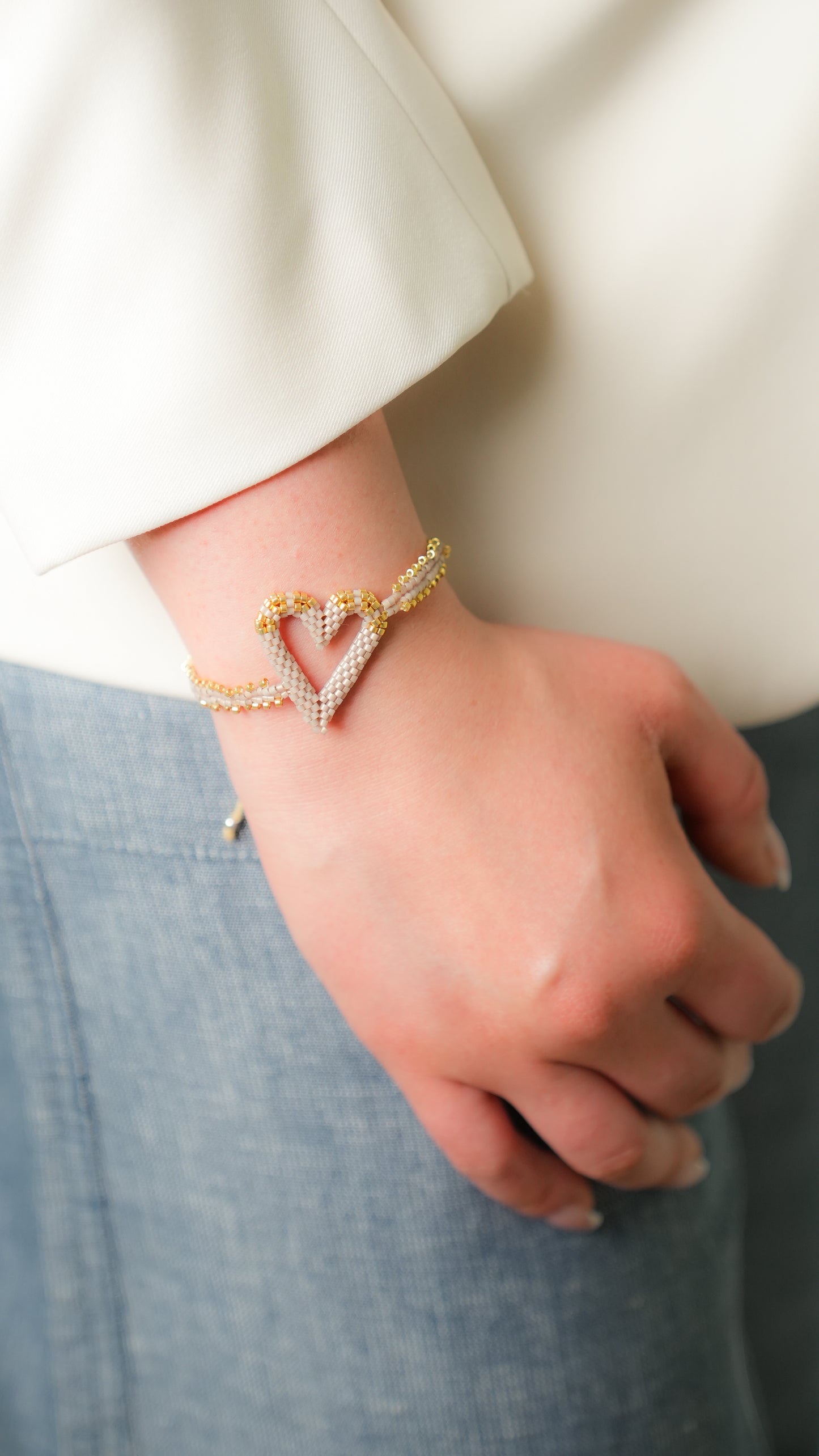 Pulsera Miyuki corazón nude oro 3D