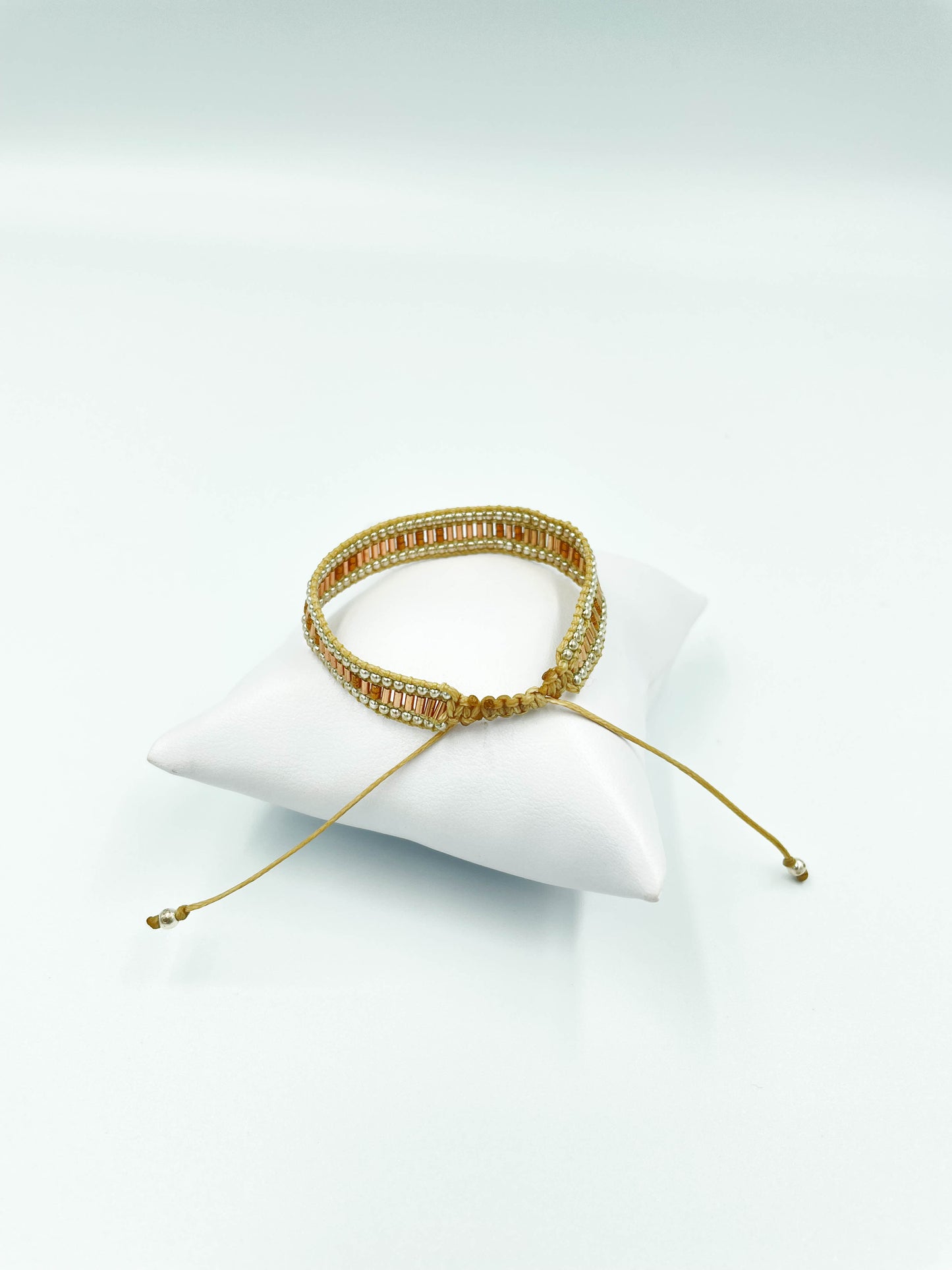 Pulsera Miyuki oro rosado con balines en plata