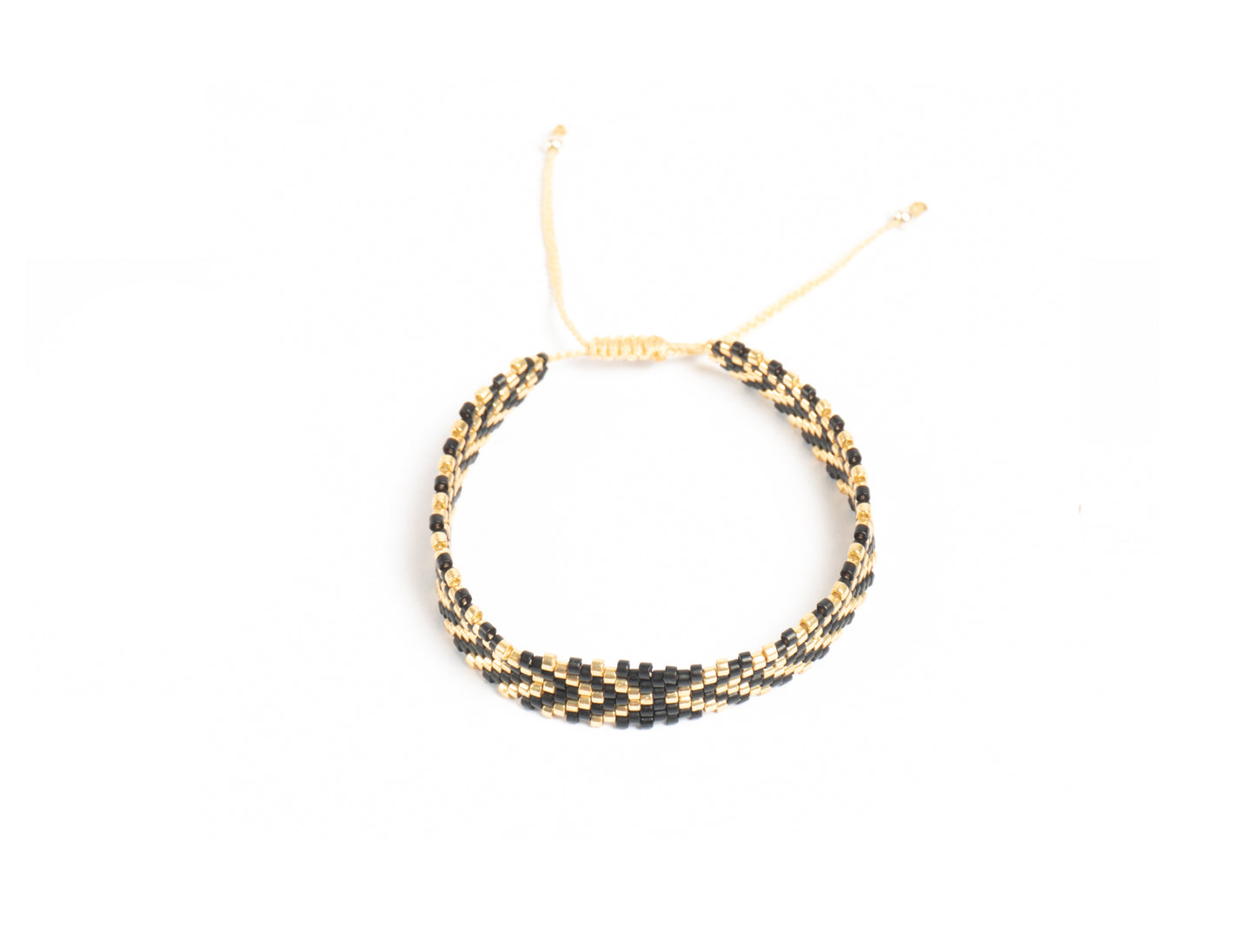 Pulsera Miyuki chica flechas negro dorado