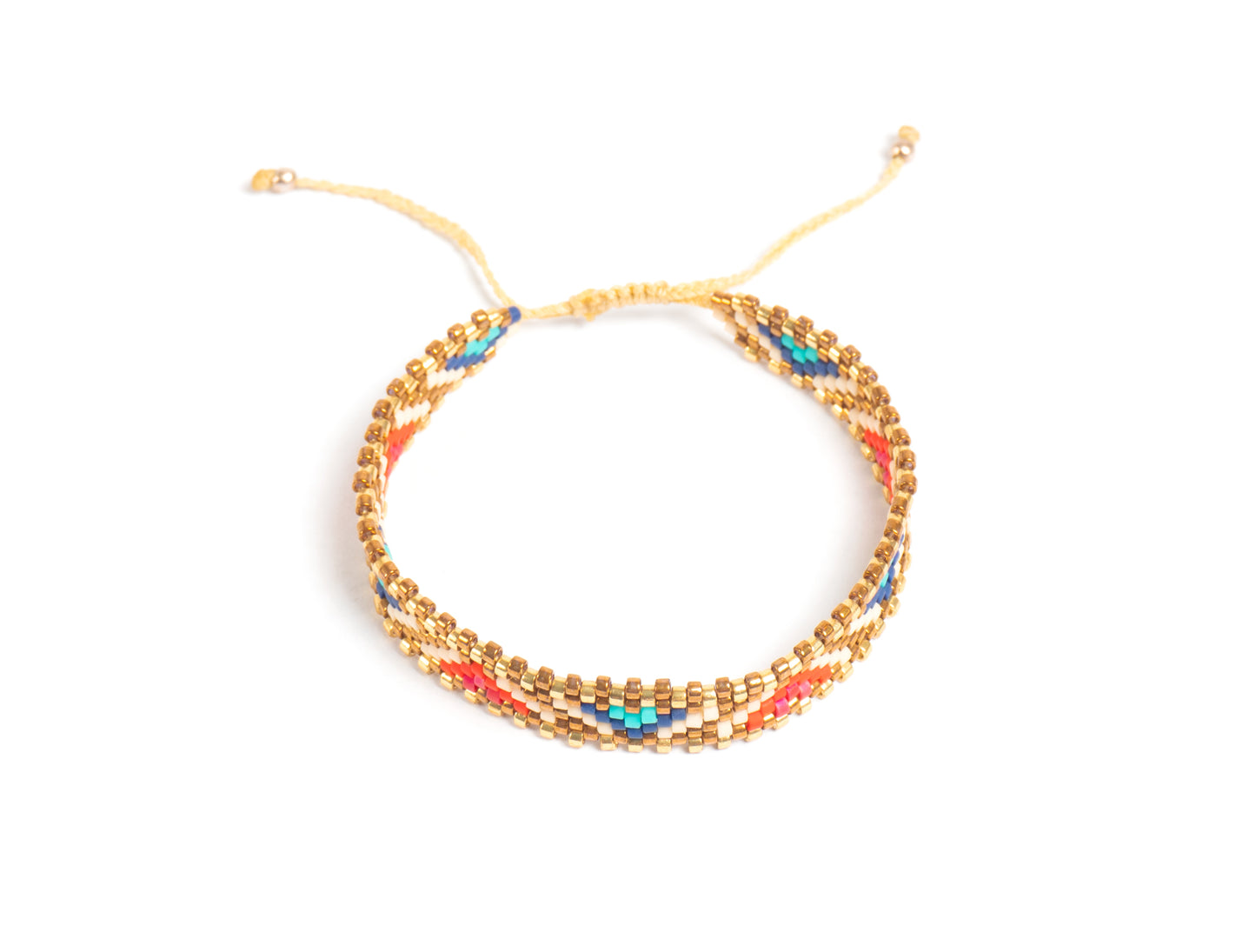 Pulsera Miyuki chica lineas doradas y triangulos rojo azul