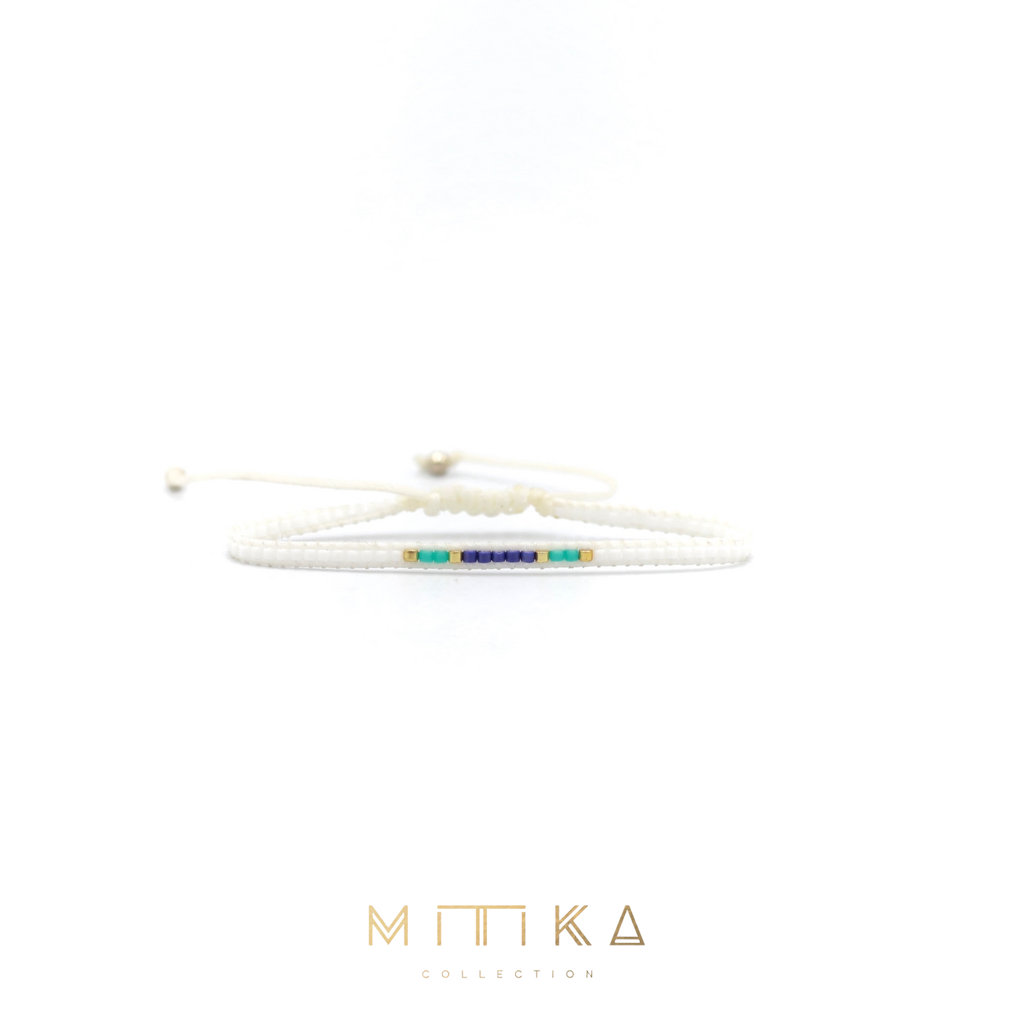 Pulsera Miyuki linea sencilla blanco con turqueza