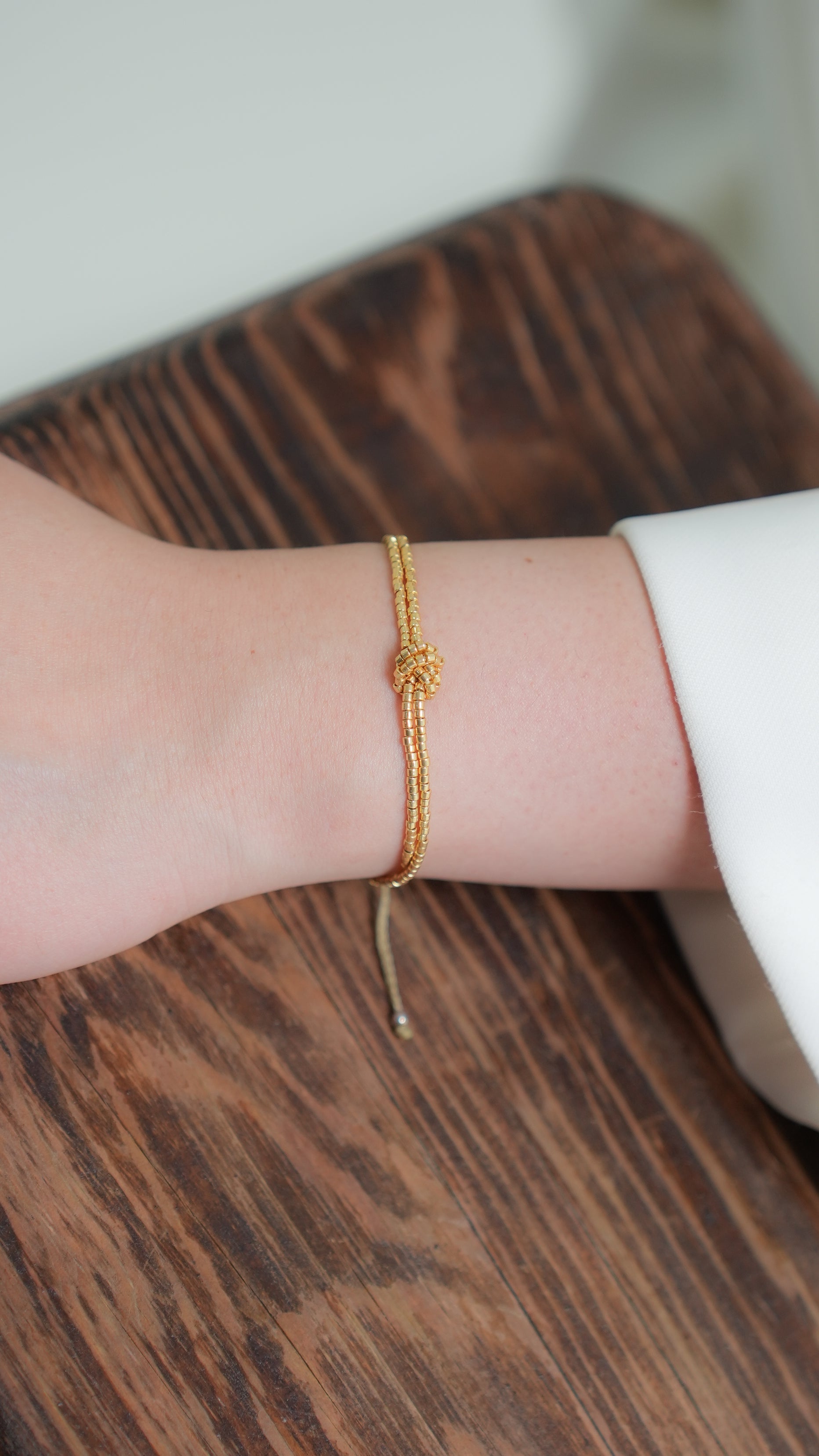 Pulsera MIYUKI NUDO dorada