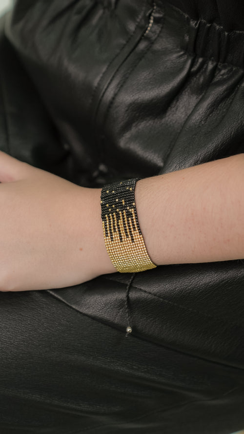 Brazalete Miyuki negro y dorado