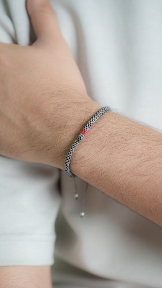 Pulsera Miyuki Caballero redonda gris centro tinto marino ocre