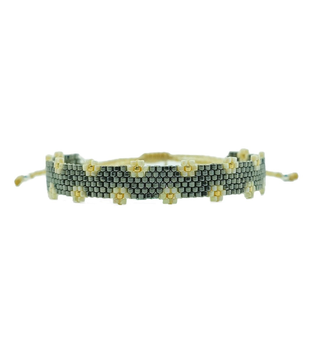 PULSERA OXFORD CON FLORES NUDE
