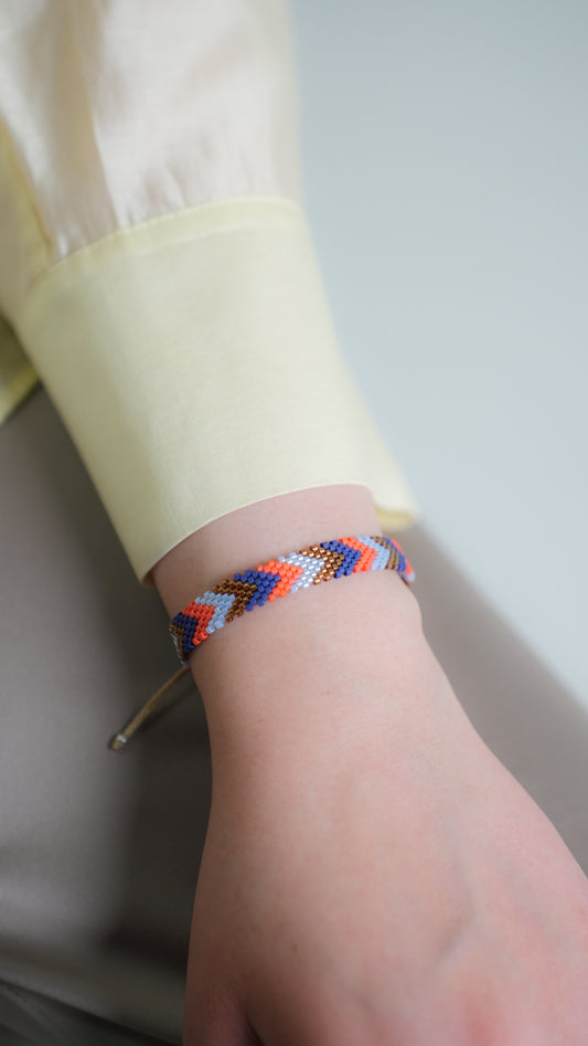 Pulsera Miyuki chica flechas azul ocre naranja