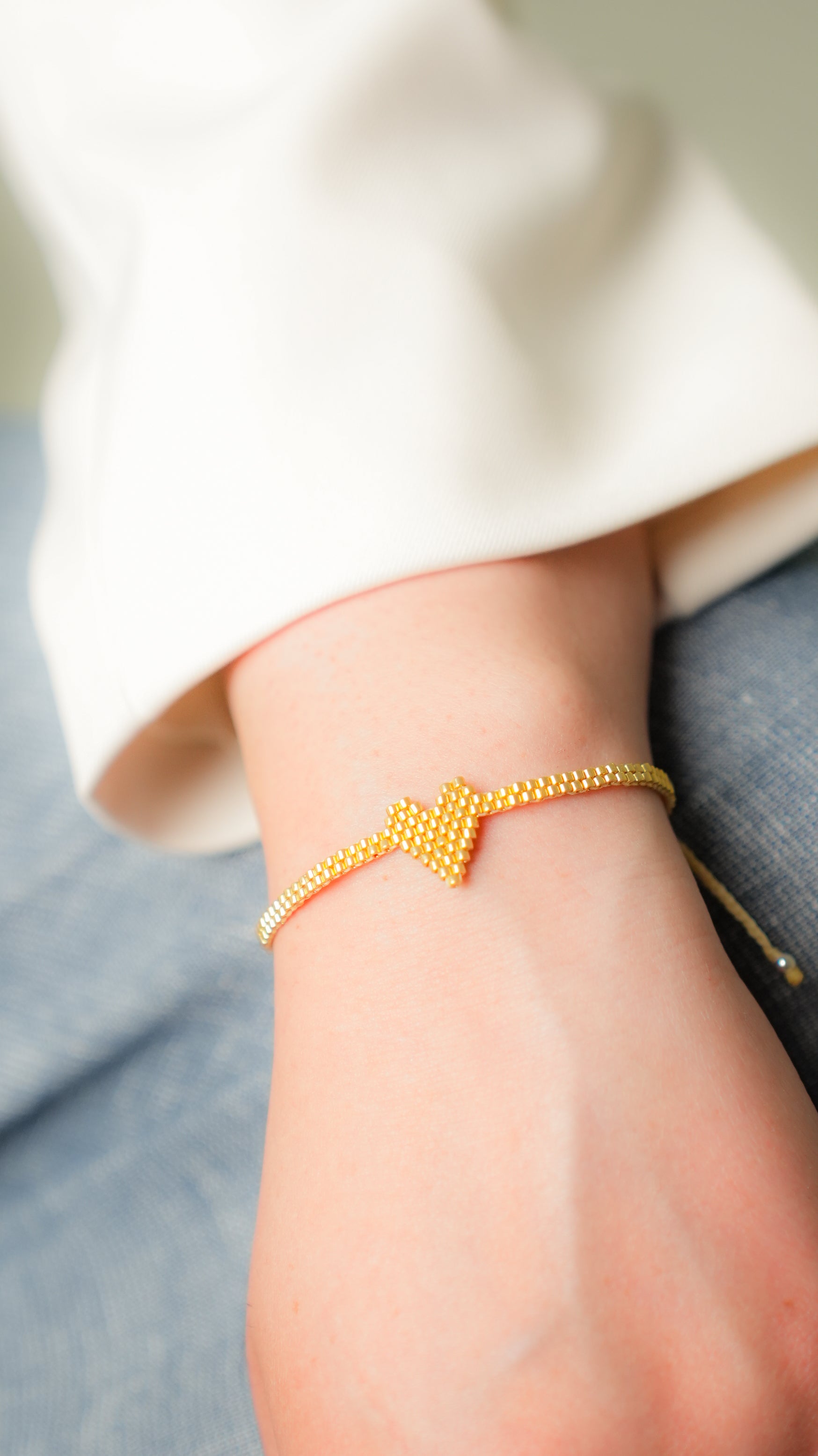 Pulsera Miyuki corazón dorado