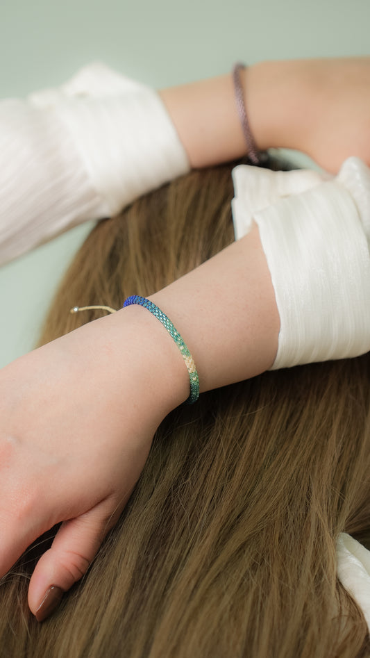 Pulsera Miyuki redonda combinacion azules con blanco