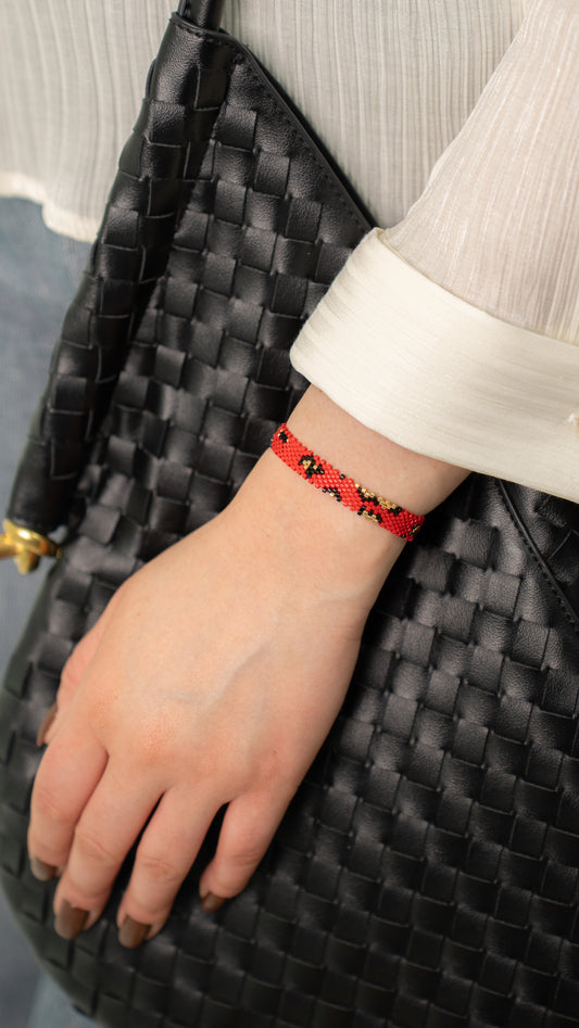 Pulsera Miyuki chica animal print roja