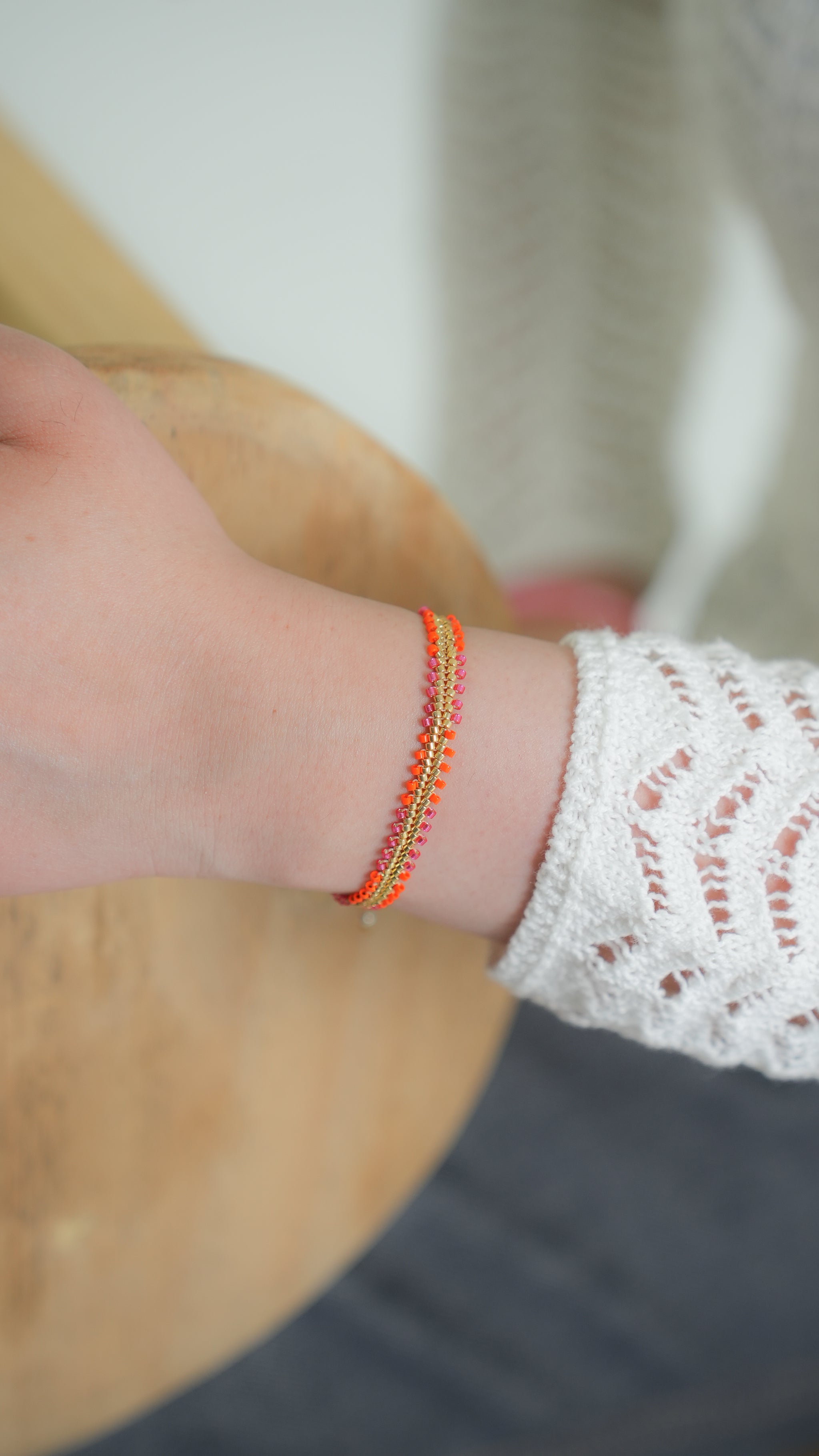 Pulsera Miyuki TRENZA naranja magenta