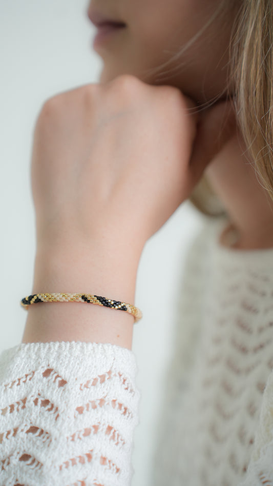 Pulsera Miyuki redonda beige oro negro