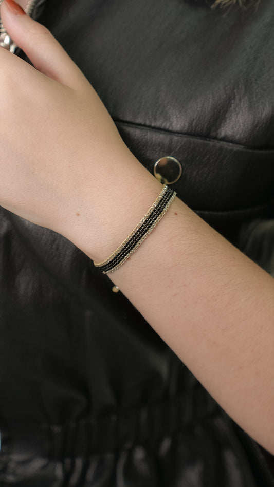 Pulsera MIYUKI chica negra orilla plata