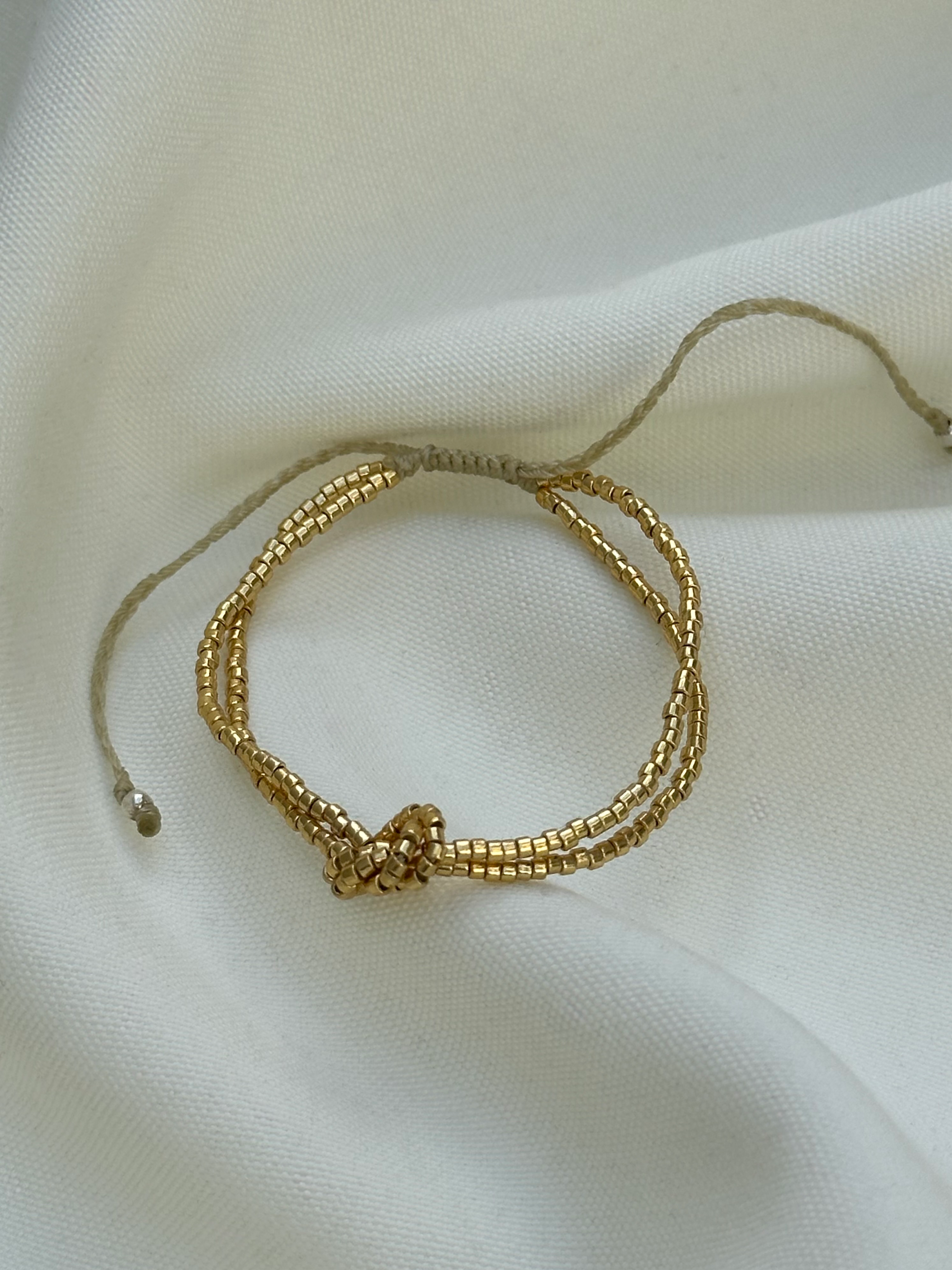 Pulsera MIYUKI NUDO dorada