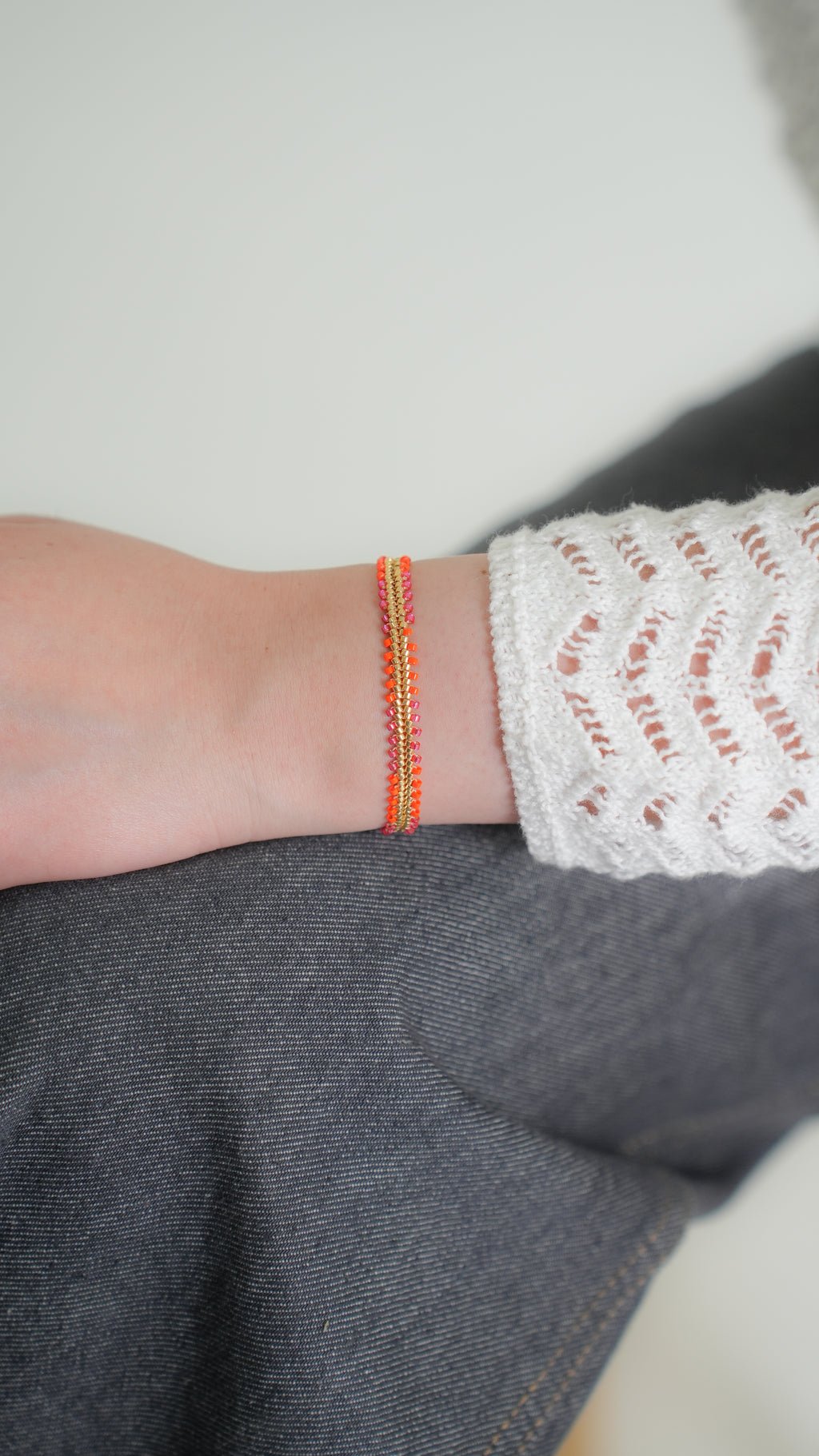 Pulsera Miyuki TRENZA naranja magenta