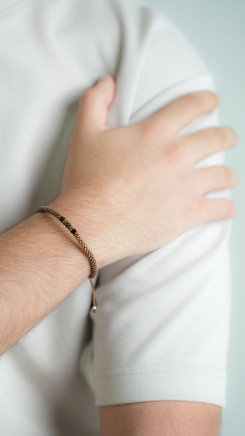 Pulsera Miyuki Caballero redonda cafe centro negro ocre