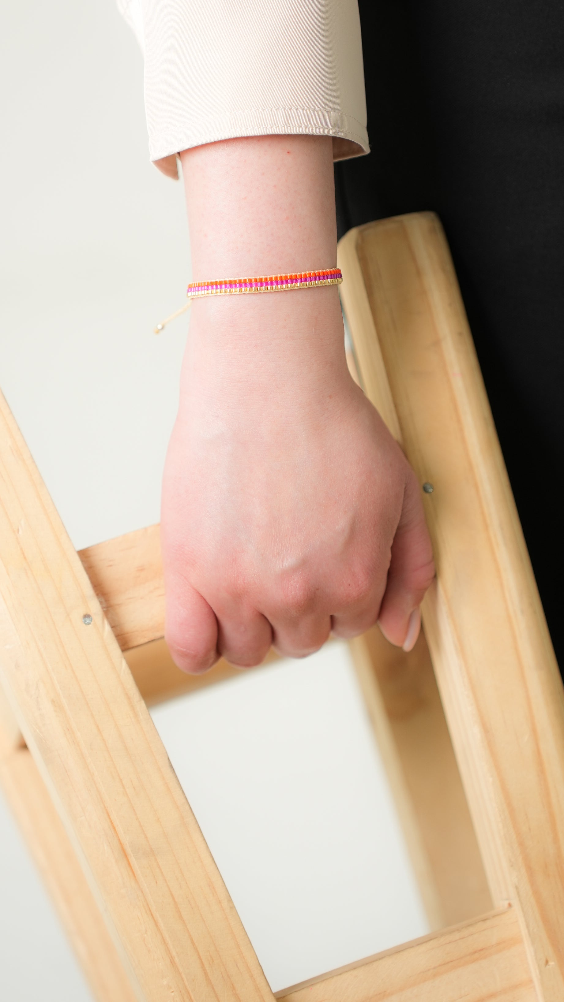 Pulsera Miyuki 3 lineas naranja magenta oro