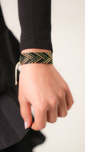 Pulsera Miyuki Grande flecha cruzada verde oro negro