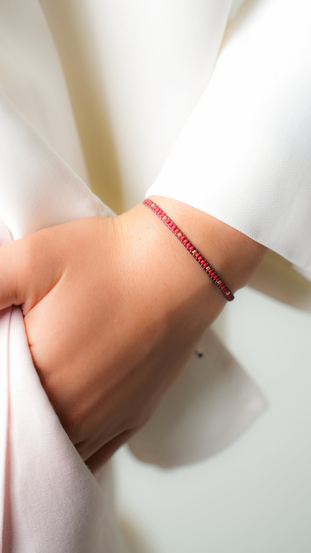 Pulsera Miyuki LINEA SENCILLA tinto oro