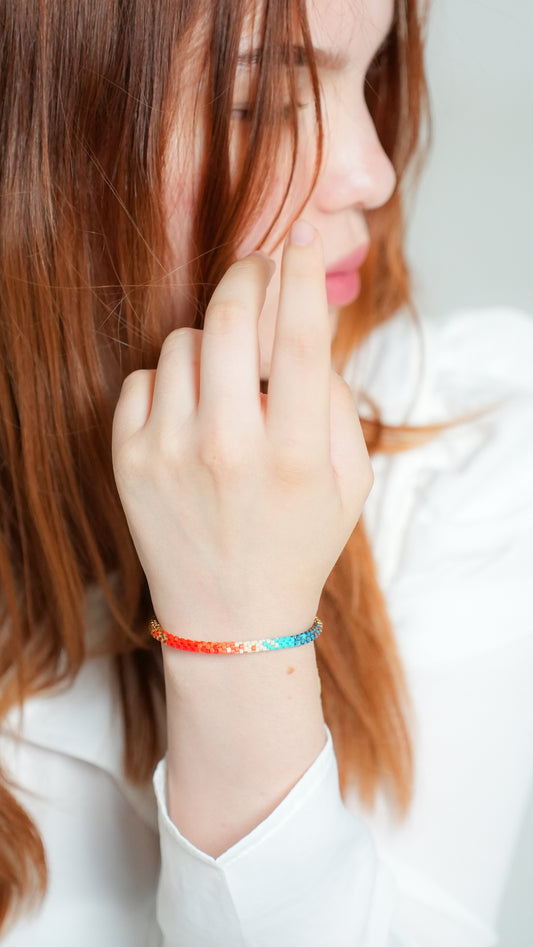 Pulsera Miyuki redonda combinación turquesa rojo naranja ocre