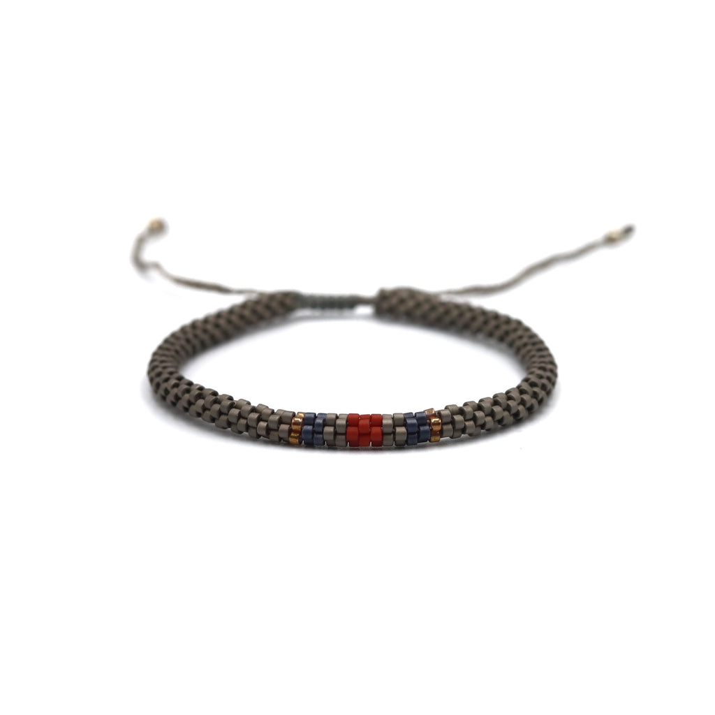 Pulsera Miyuki Caballero redonda gris centro tinto marino ocre