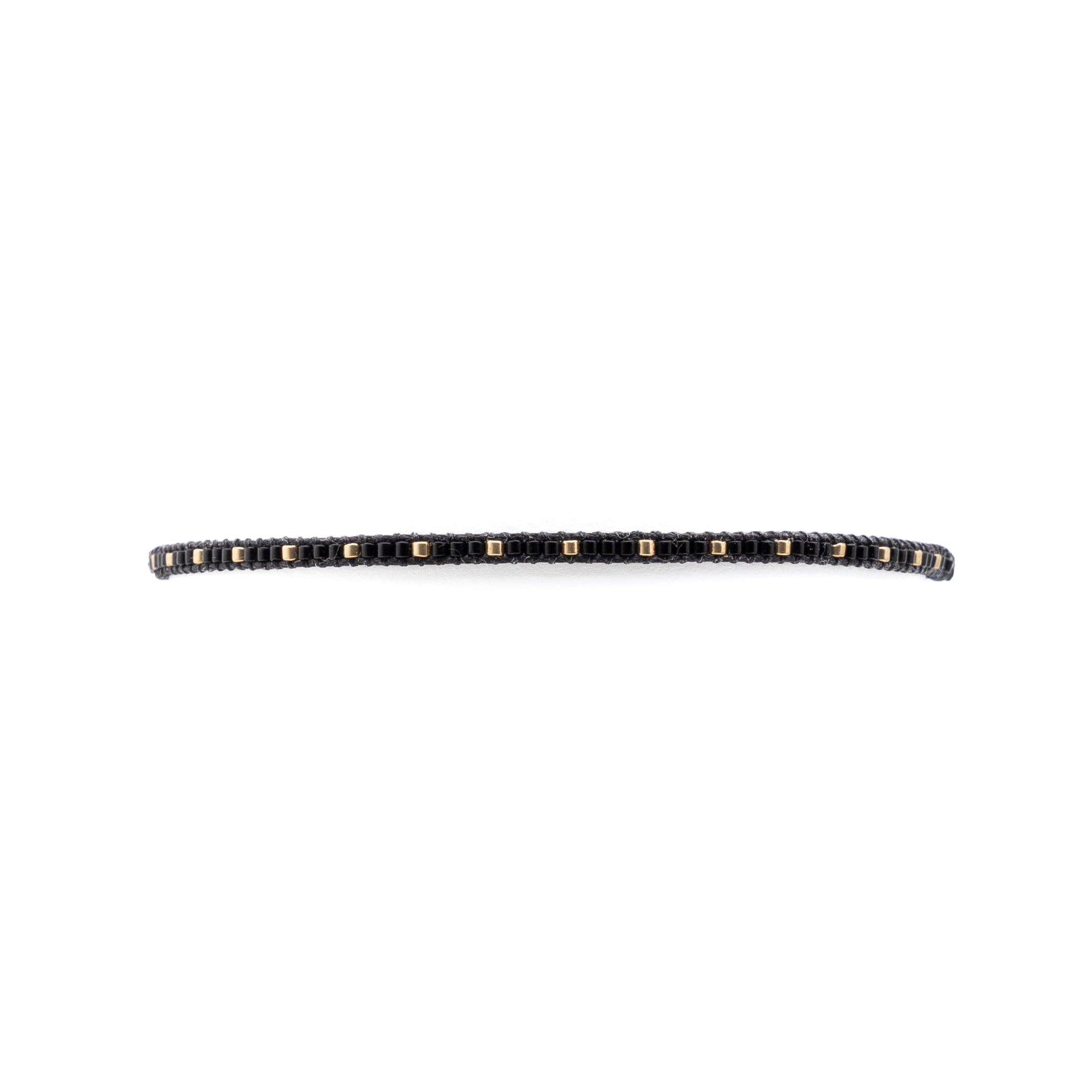 Pulsera Miyuki linea sencilla negro oro