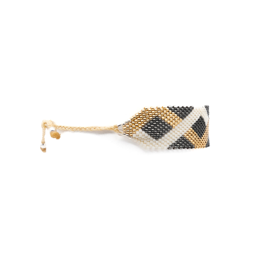 Pulsera Miyuki grande oxford lineas cruzadas blanco y dorado