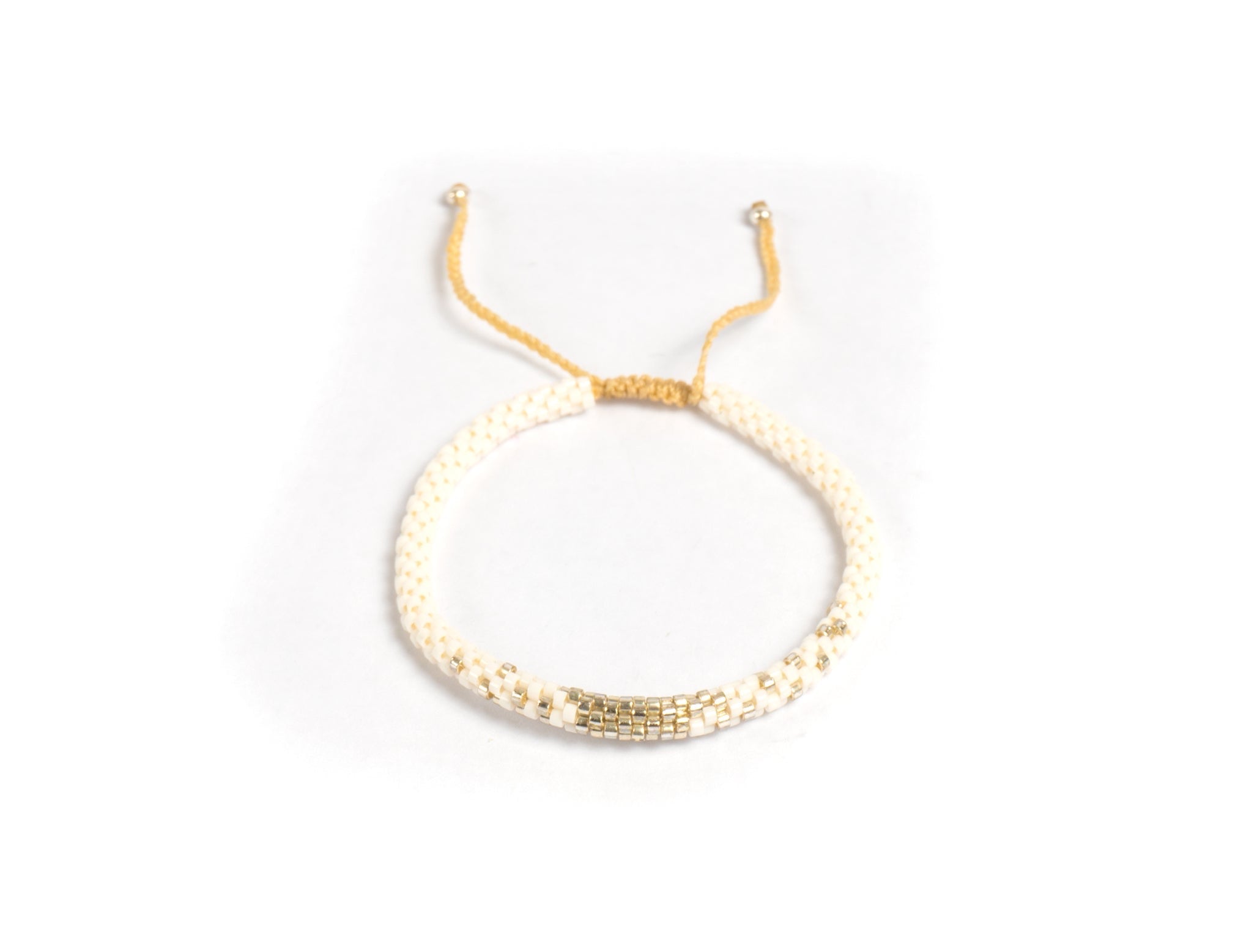 Pulsera Miyuki redondas blancas