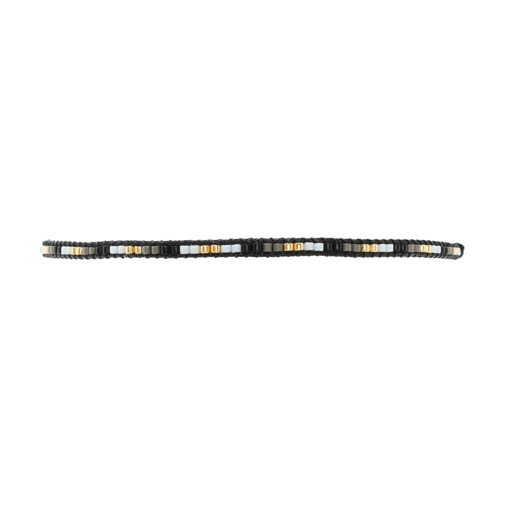Pulsera Miyuki linea sencilla Negro blanco oxford oro
