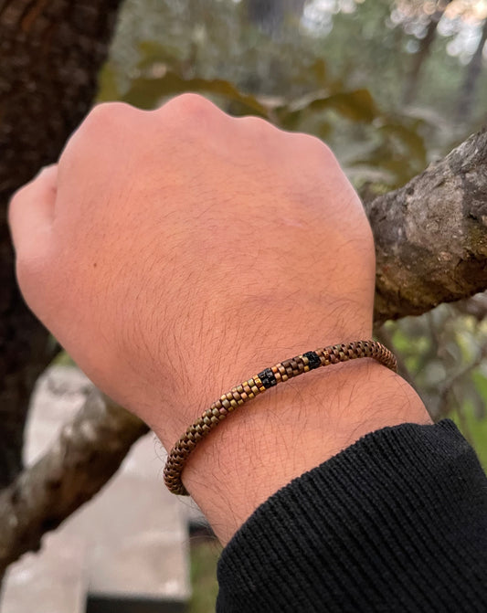 Pulsera Miyuki Caballero redonda cafe centro negro ocre