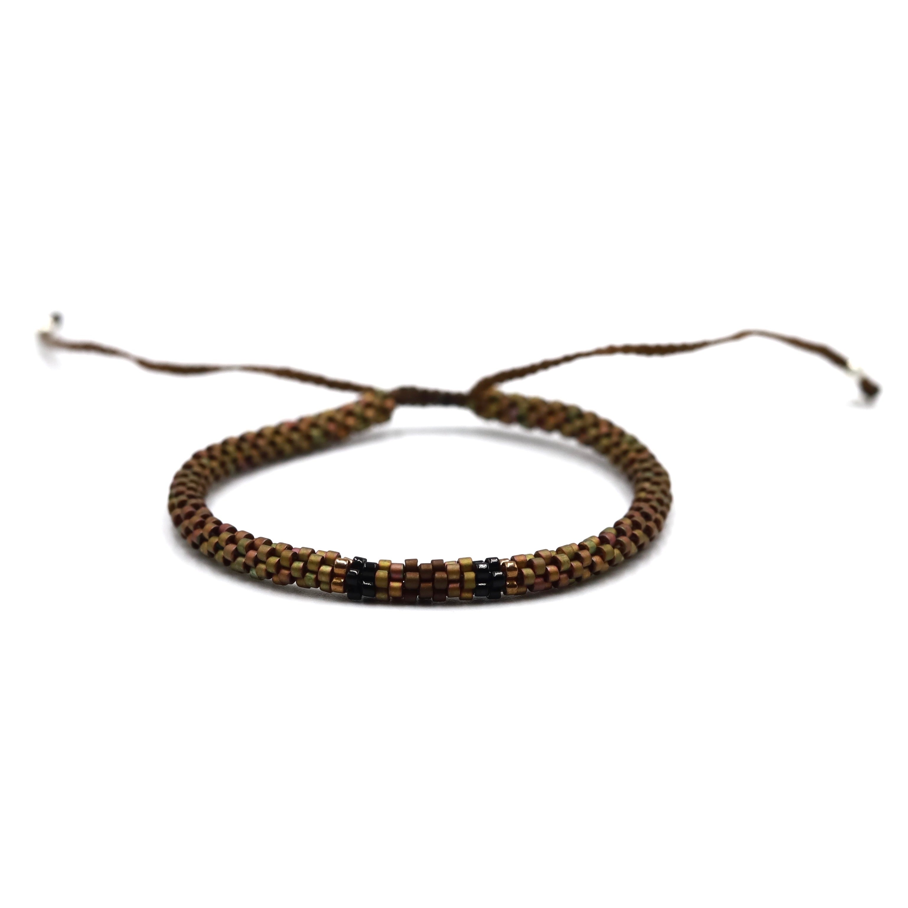 Pulsera Miyuki Caballero redonda cafe centro negro ocre