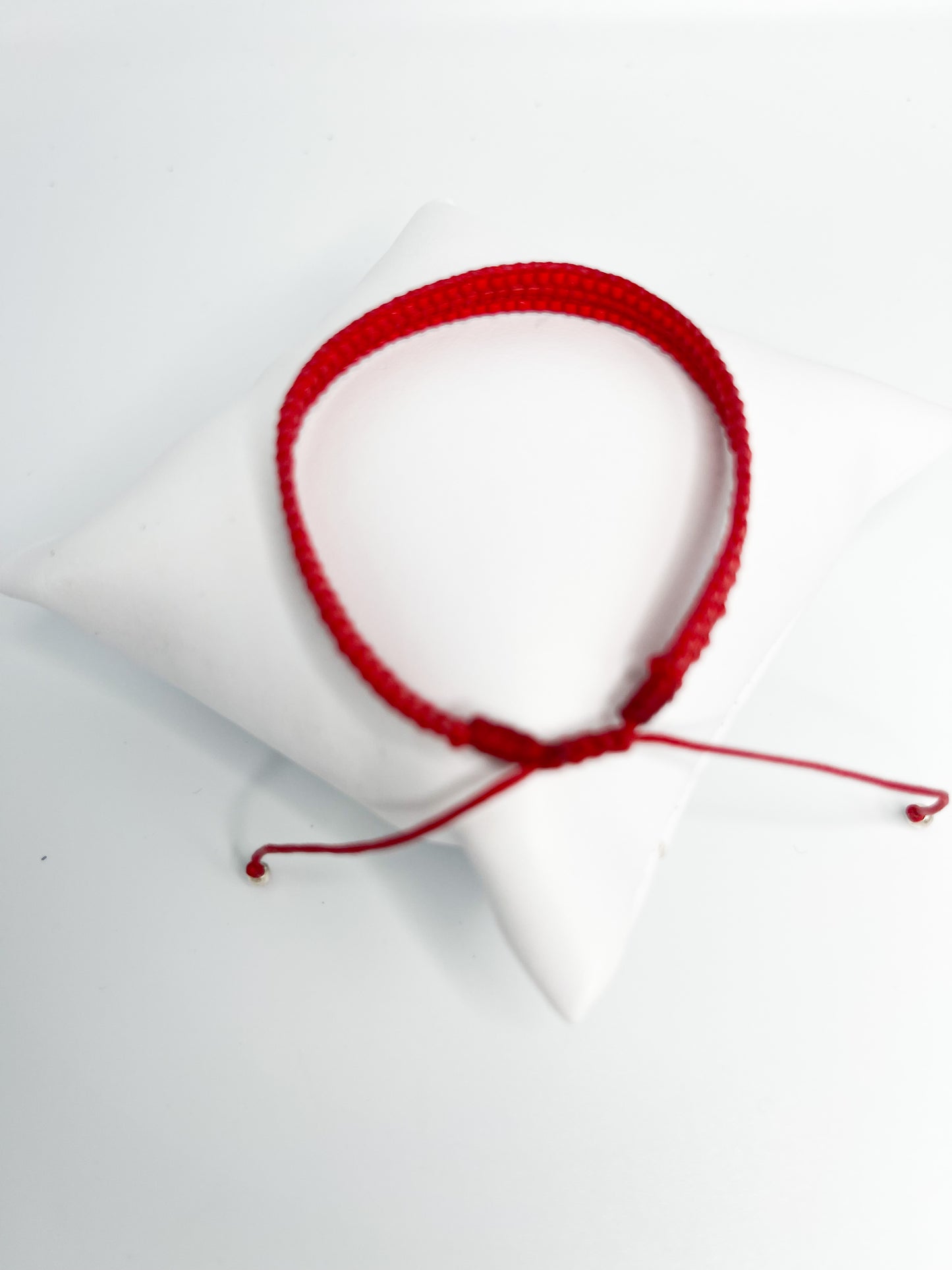 Pulsera Miyuki y cuero encerado rojo