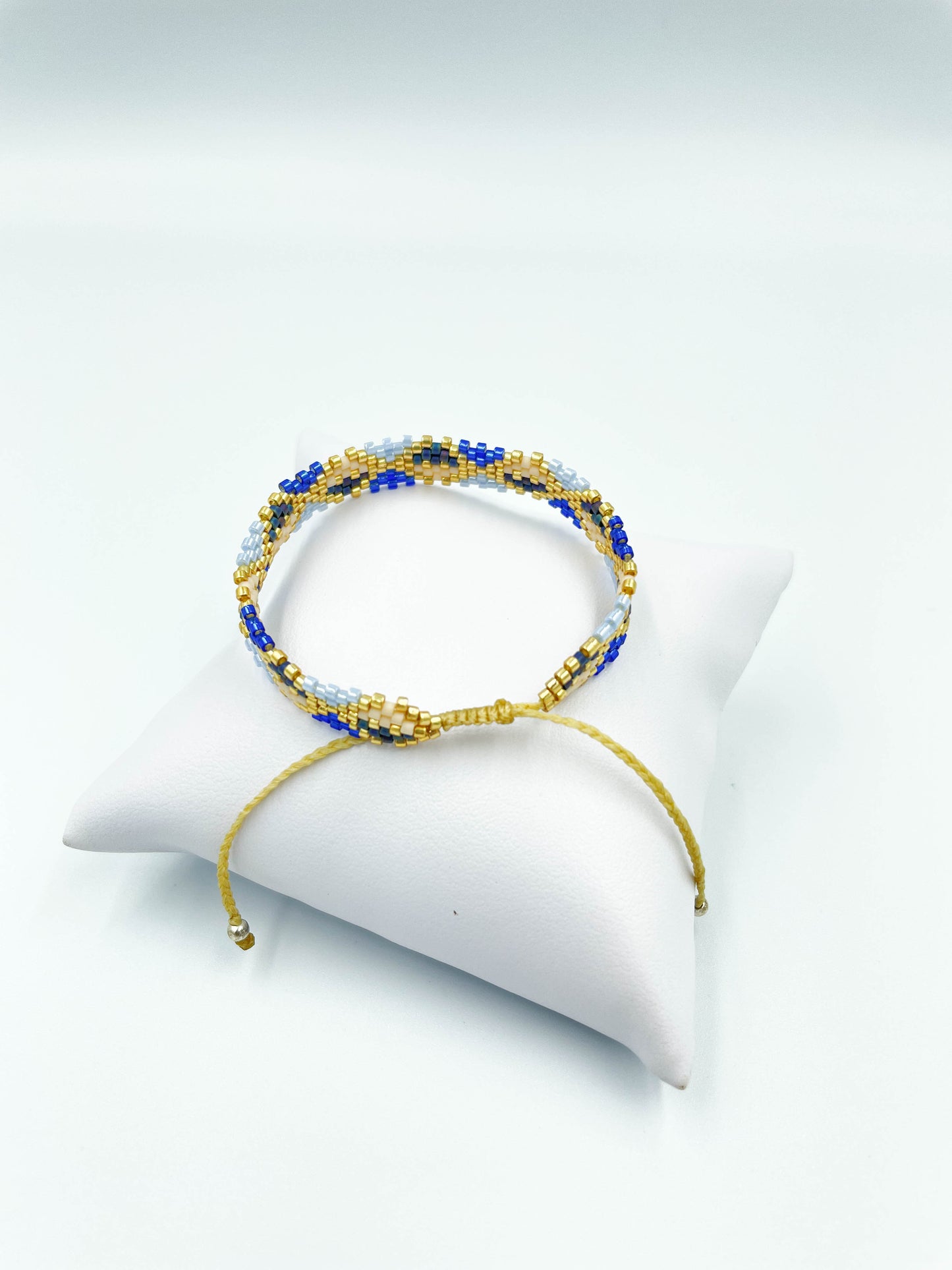 Tobillera (Miyuki) triangulos azules
