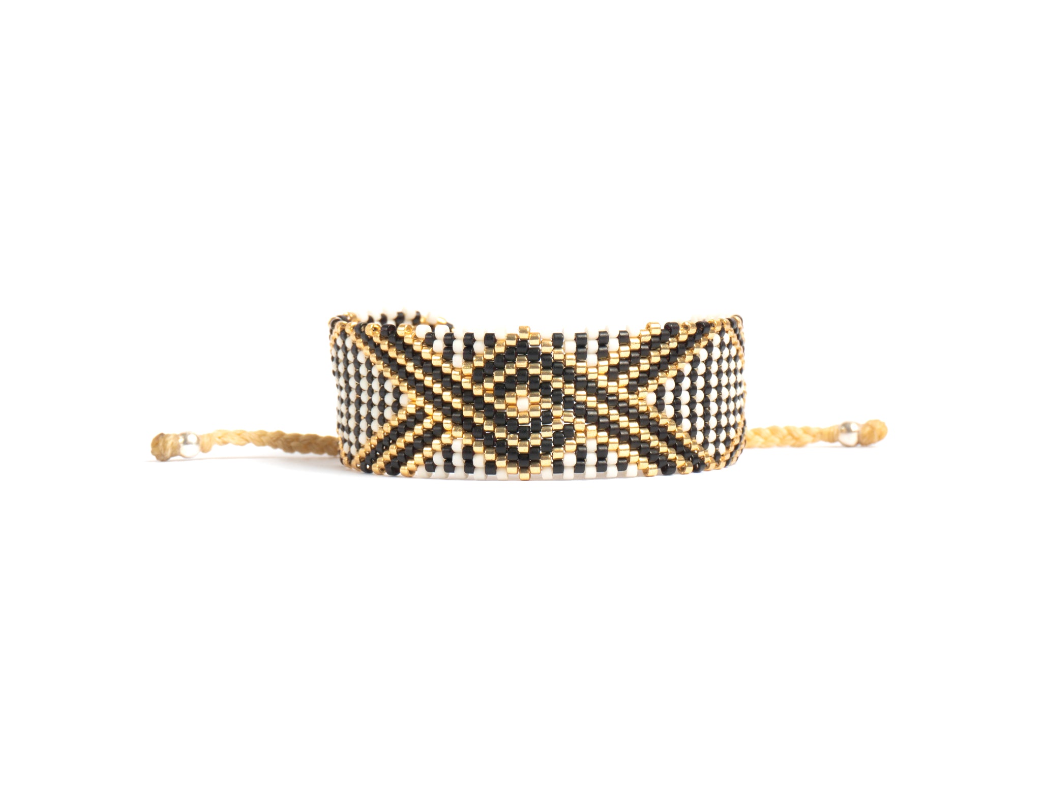 Pulsera Miyuki grande blanca lineas cruzadas negro oro