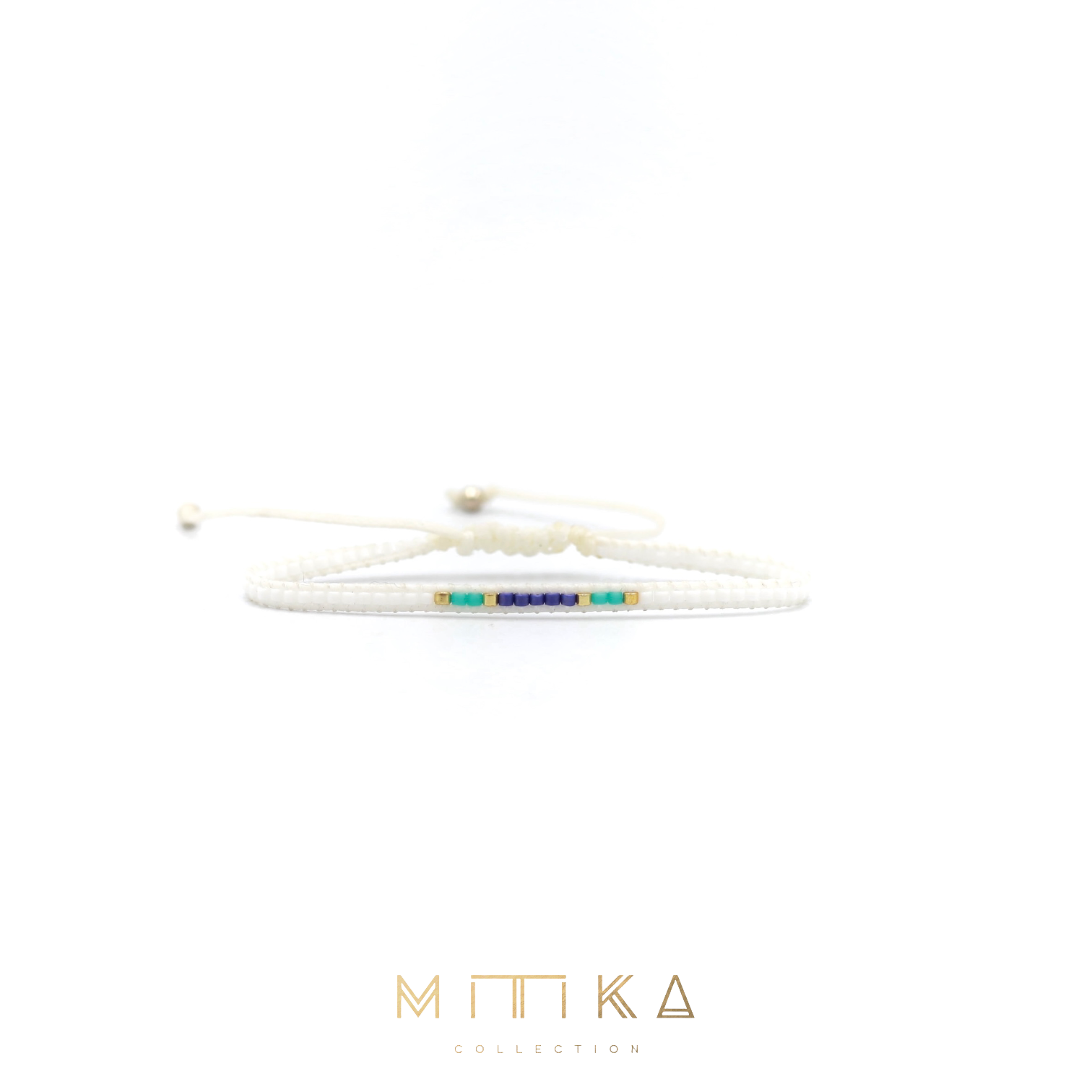 Pulsera Miyuki linea sencilla blanco con turqueza
