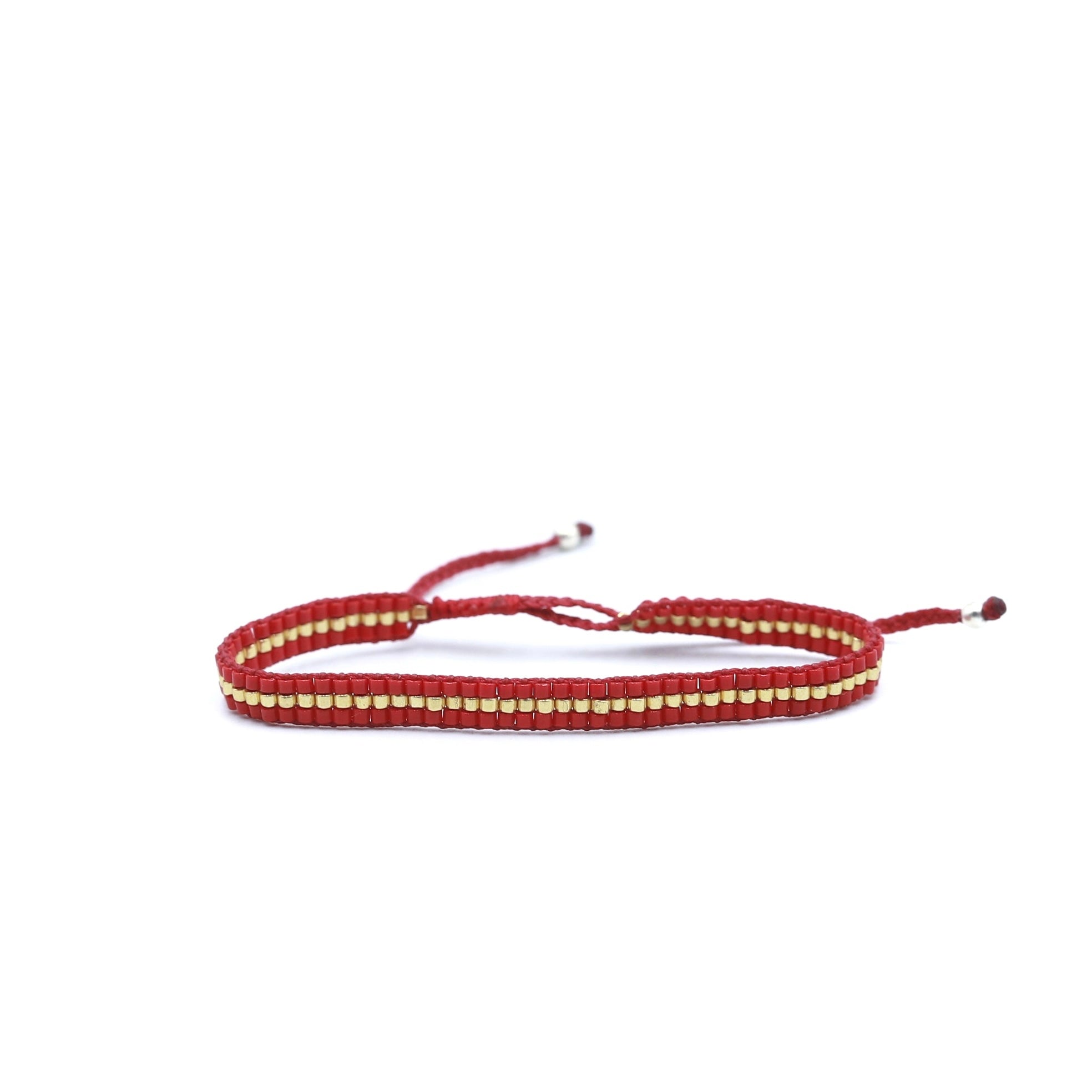 Pulsera MIYUKI 3 lineas rojo centro dorado