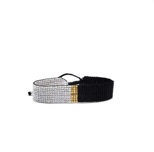 Brazalete Miyuki negro blanco tornasol centro oro
